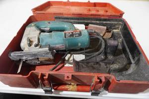 lot 29 image: Hilti case wBosch jigsaw