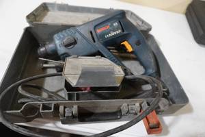 lot 40 image: Bosch 11200 VST drill & bits