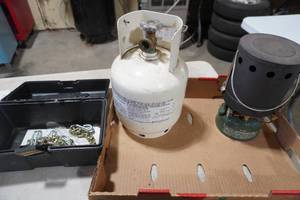 lot 97 image: Coleman camp stove, small lp tank, tire changer