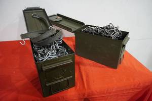 lot 182 image: Two ammo boxes of tire chains for 4 wheelers