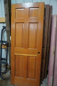 lot 232 image: Seven wood interior doors, some raised panel
