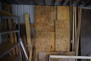 lot 236 image: Scrap lumber, panels, 2 x 4s etc...