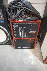 lot 6 image: Century 230 Amp AC Welder & welding rods