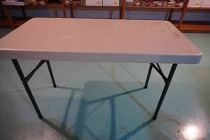 lot 284 image: Poly Lifetime folding table 2 x 4