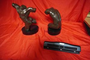 lot 21 image: Two partial statues-male and 3 hole punch