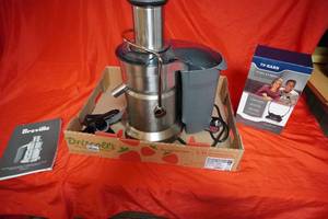 lot 26 image: Breville Juice Processor & TV Ears