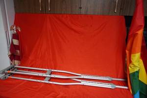 lot 47 image: USA & Pride flags, aluminum crutches