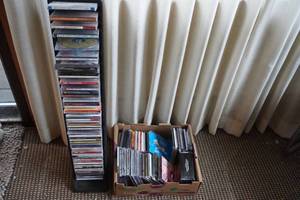 lot 65 image: Box and rack of CDs