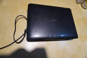 lot 78 image: Sony portable DVD player & note book
