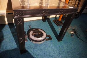 lot 104 image: Two black glass top end tables 28 Square, 24 Tall