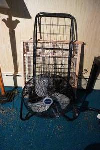 lot 106 image: Safety gate, Lasko fan, blk roller grocery cart