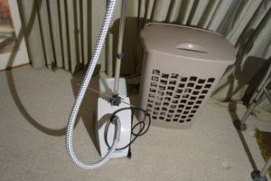 lot 124 image: Steamfast suit cleaner & hamper
