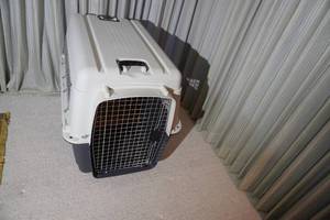lot 126 image: Large portable dog kennel on rollers