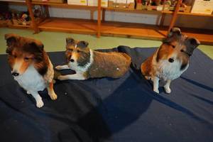 lot 215 image: Three Sheltie statues