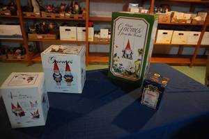 lot 224 image: Four Gnomes in boxes