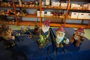 lot 237 image: Four Gnomes and small ones on a rope
