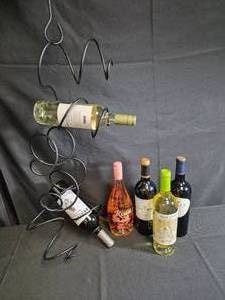 lot 8 image: Hanging Metal Wine Rack with 6 Bottles Wine
