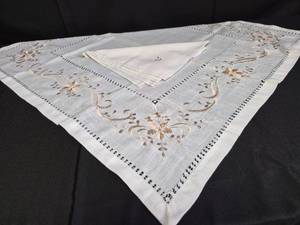 lot 22 image: Small Embroidered Tablecloth with Four Napkins