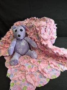 lot 74 image: Handmade Flannel Blanket and Bear - Pink and Purple