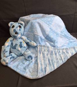 lot 95 image: Handmade Flannel & Fleece Quilt with Bear