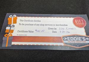 lot 133 image: $100 Gift Certificate Eddies Auto