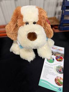 lot 33 image: Stuffed Animal Dog, and 4 Admission to A MazeN Farmyard.