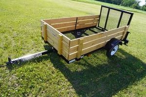 lot 2 image: Teske 4 x 8 Woody Two wheel trailer