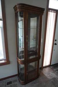 lot 105 image: Curio cabinet, two door lighted, 27 W x 12 D x 76 T