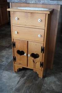 lot 111 image: Two Door, two drawer kitchen cabinet 18 W x 10 D x 33 T