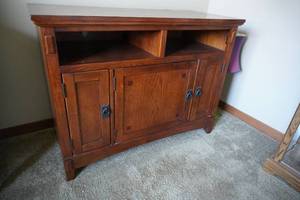 lot 132 image: Wood cabinet w 3 doors 42W x 20 D x 32 T