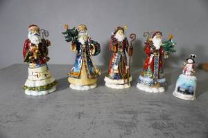 lot 219 image: Four Santas and Snowman Bell