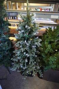 lot 97 image: Two plus Christmas trees and tree skirt