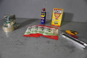 lot 291 image: d-CON, Tom cat glue boards, tape, tools