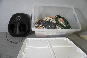 lot 301 image: Foot massager with tub of cords and power strips