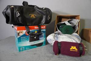 lot 304 image: Honeywell humidifier, blankets, leather bag