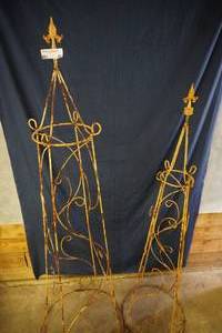 lot 93 image: Two metal decorative stands