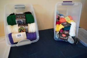 lot 197 image: Two tubs knitting worsted yarn