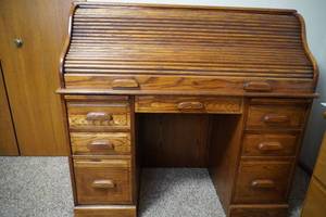 lot 244 image: Solid wood rolltop desk 48 W x 21 D x 46 T