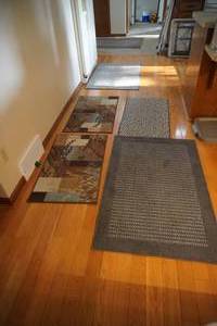 lot 246 image: Six rubber back throw rugs
