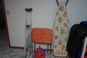 lot 272 image: Iron board, cord reel, TV trays, crutches