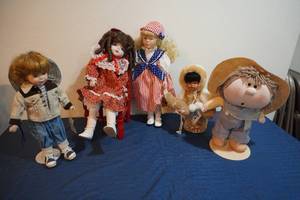 lot 284 image: Five Patriotic Dolls on stands, doll chair