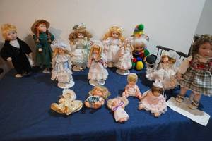 lot 285 image: Five Dolls and Five baby dolls