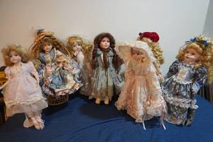 lot 286 image: Eight fancy dolls