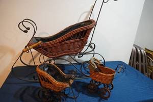 lot 299 image: Two sleighs and wicker baby buggy