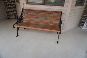 lot 348 image: Porch bench with cast iron ends