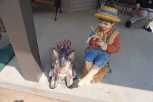 lot 349 image: Concrete Donkey and Fishing Boy