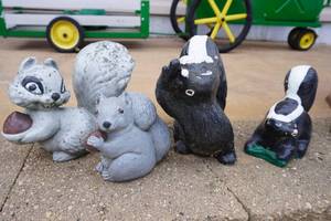 lot 356 image: Skunk & Squirrel family-concrete