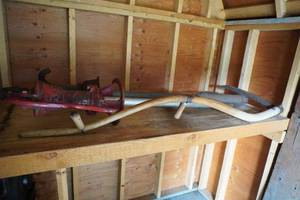 lot 372 image: 2) Hand pumps and hand scythe
