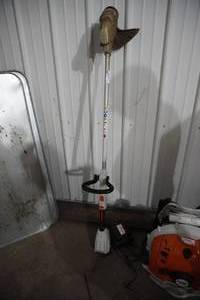 lot 35 image: Stihl Battery weed trimmer & charger