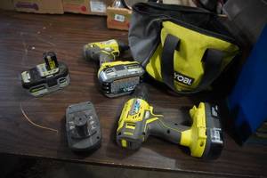 lot 67 image: Ryobi impact drill wcharger and two batteries